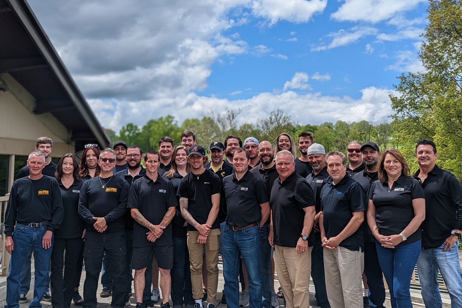 Big Fish Roofing complete team photo at office Pittsburgh PA roofing company staff